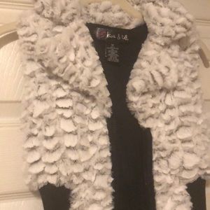 Kiss and tell faux fur sweater vest size medium.